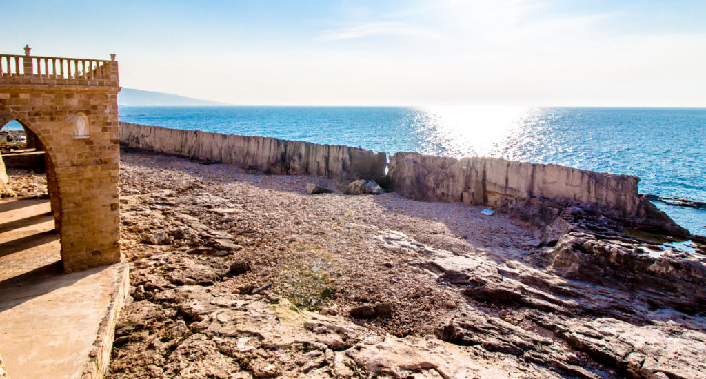 ancient Phoenician wall built for protection from tidal waves, in Batroun, Lebanon