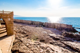 ancient Phoenician wall built for protection from tidal waves, in Batroun, Lebanon