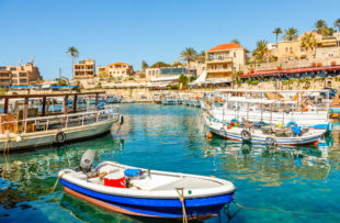 Mediterranean Jbeil port lagoon with anchored fishing boats, Byblos, Lebanon